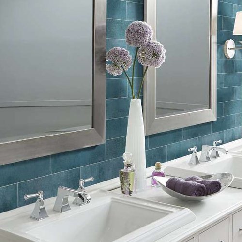 bathroom with teal tile backsplash