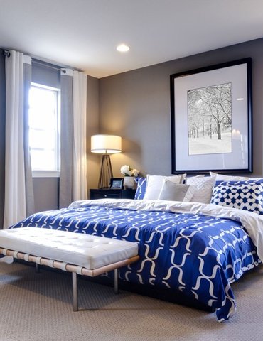 Bedroom with blue bed colour