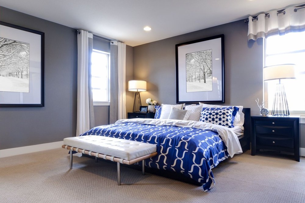 Bedroom with blue bed colour